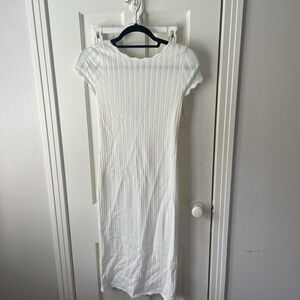 Aritzia white dress new with tags. Never worn.